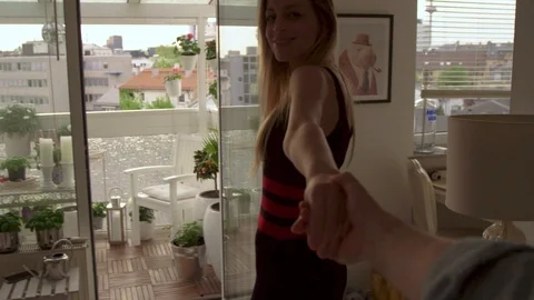 Couple drinking wine on a balcony  Video stock 111256517