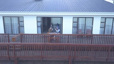 Couple drinking wine on deck Stock Footage 104311676