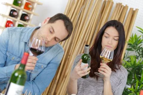 Couple drinking wine Stock Photos