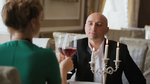 Couple Drinking Wine in Restaurant Stock Footage 68902967