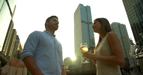 Couple Drinking Wine on River, Chicago Stock Footage 98880667