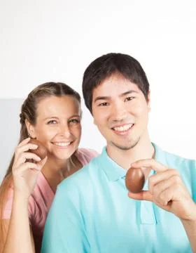 Couple with easter eggs Stock Photos