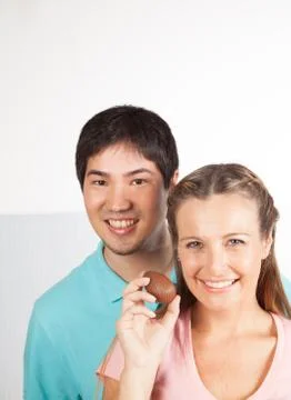 Couple with easter eggs Stock Photos