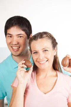 Couple with easter eggs Stock Photos