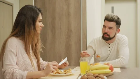 Couple eating lunch Stock Footage 100001321