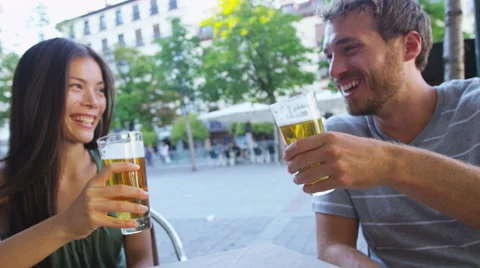 Couple eating tapas drinking beer in Madrid Spain Stock Footage 62734872