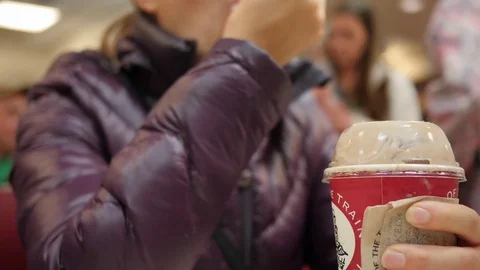 Couple eats a chocolate milkshake on a date Stock Footage