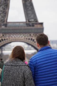 Couple with the Eiffel tower in the background Stock Photos