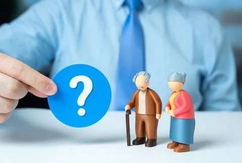 A couple of elderly people ask a question while an official responds. Communi Stock Photos