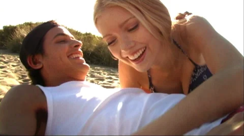 Couple embracing on beach Stock Footage 43688536