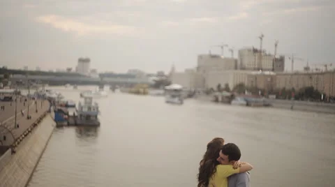 Couple embracing on the bridge Stock Footage 55336522