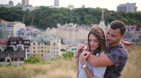 Couple embracing on the city background Stock Footage 68355142