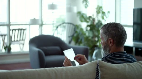 Couple embracing on couch. Stock Footage 64121027