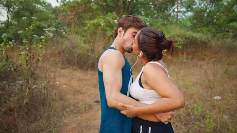 Couple Embracing kissing While Exercise Stock-Footage 298236576
