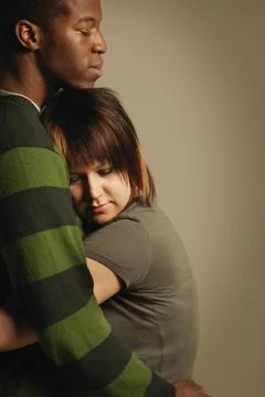 A Couple Embracing Stock Photos