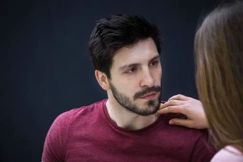 Couple engaging in serious conversation Stock Photos