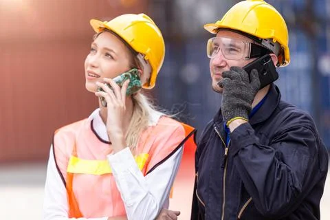 Couple engineer team Phone Calling, Worker help support contacts or connect.. Fotos Stock