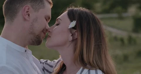 The couple enjoy each other in the summer on the nature Stock Footage 136043671