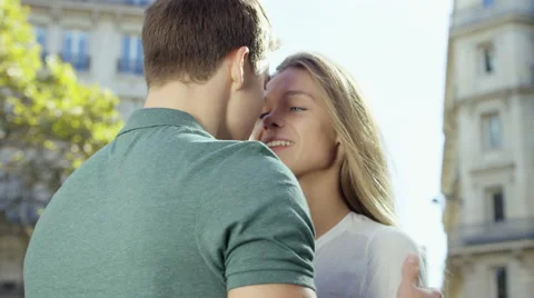 Couple enjoy a quick kiss while in the city Stock Footage 63028929