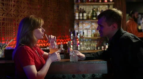 Couple Enjoying Drink In Bar Stock Footage 62237320
