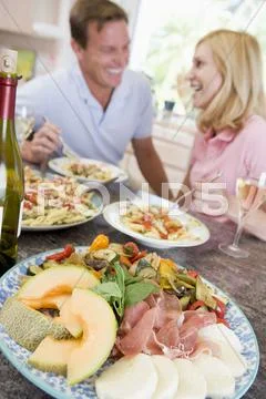Couple enjoying meal,mealtime together Stock Photos