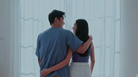 Couple enjoying a moment of intimacy while standing together Stock Footage 305228361