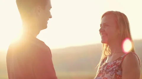 Couple enjoying the sunset time Stock Footage 53669758