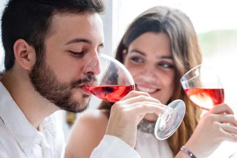 Couple enjoying wine tasting. Stock Photos