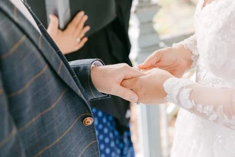 Couple exchanges vows during an intimate wedding ceremony in a picturesque 스톡 사진