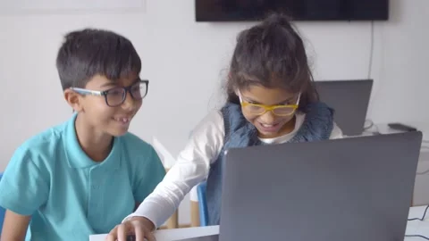 Couple of excited classmates working on task Video stock 143281647