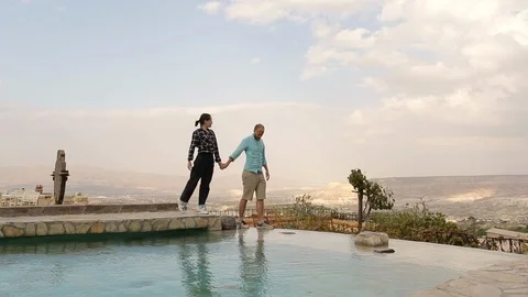 Couple Exploring The Valley Of Cappadocia Stock Footage 123695359