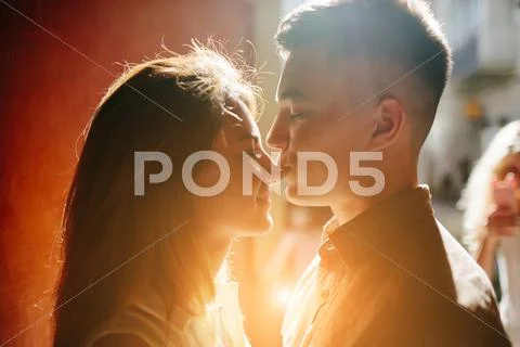 Couple facing each other Stock Photos