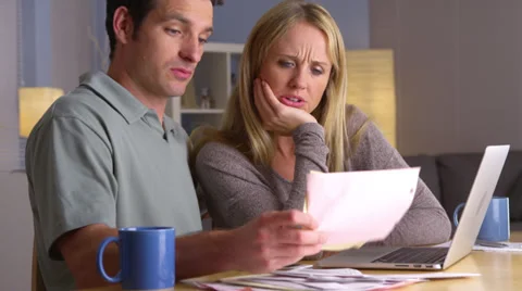 Couple feeling stressed over bills Stock Footage