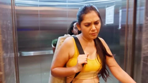 Couple fighting in an elevator Stock Footage 276776835