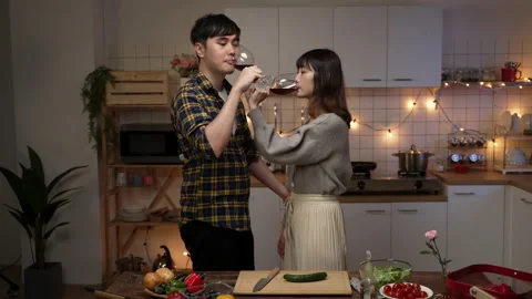 Couple flirting and enjoying champagne Video stock 168373653