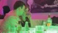 Couple flirting in nightclub, girl drinking, unhealthy lifestyle HD Footage