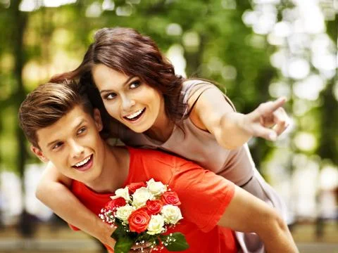 Couple  with flower at park. Foto stock