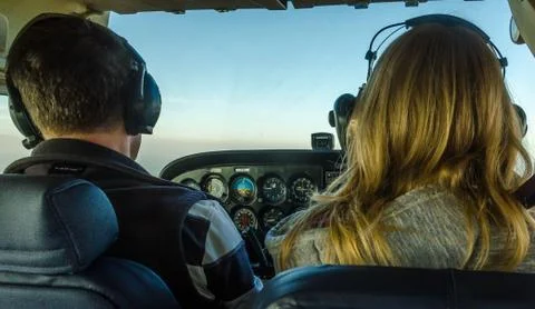 Couple flying small plane Stock Photos