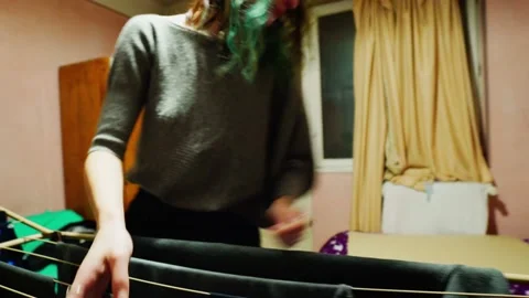 Couple Folding Laundry Together 動画素材 145843159