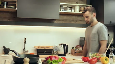 Couple fooling, having fun at the kitchen. Stock Footage 100181510