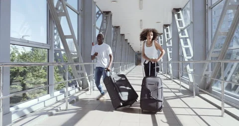 Couple of foreign students happy to arrive in new city, African American guy and Stock Footage 139113397
