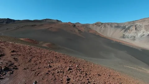 Couple &amp; FPV drone pilot flying on top of red volcano in Hawaii, 4K aerial shoot Video stock 196911019