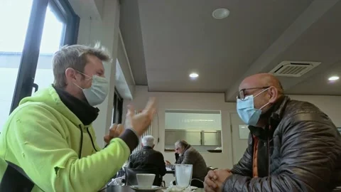 Couple of Friends Talking at Bar While Wears a Medical Mask During Covid-19 Stock-Footage 141385013