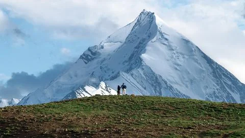Couple in front of mountain Stock Photos