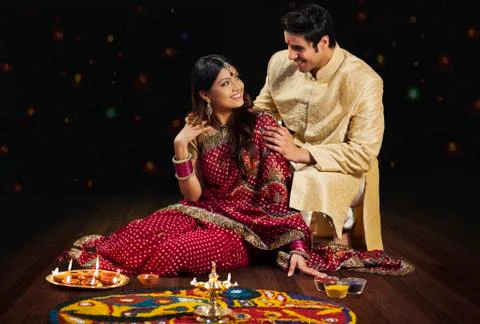 Couple in front of rangoli Stock Photos