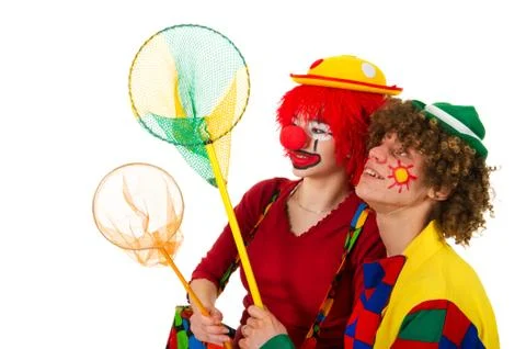 Couple funny clowns with fishing nets Stock Photos