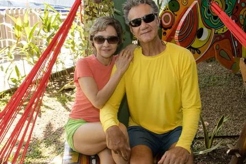 Couple by a Garden Stock Photos