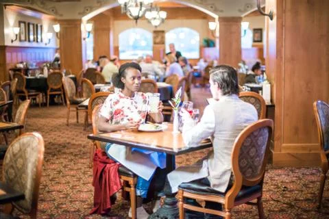 Couple Gazes at Each Other While on Date Stock Photos
