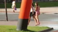 Couple of girls walking on the sidewalk, friends hanging out on sunny summer day HD Footage