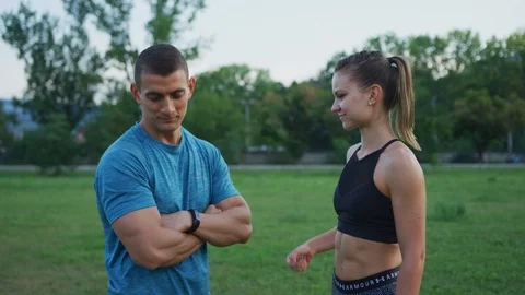 Couple giving high five Stock Footage 100033193